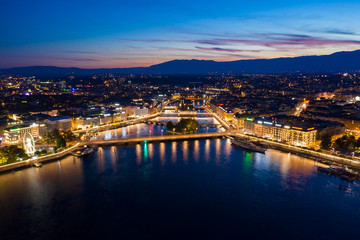 Aerial  night view of Geneva city waterfront skyline in Switzerland