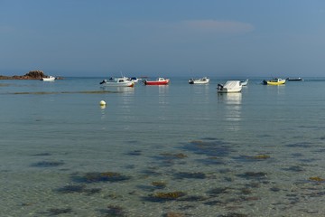 Obraz premium Le Hocq harbour, Jersey, U.K. Calm Summer sea.