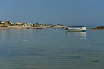 Fototapeta na wymiar St Clements Bay, Jersey, U.K. Summer coastal calm sea.