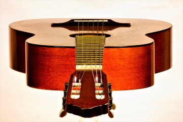 Guitar-string plucked musical instrument. It is used as an accompanying or solo instrument in many styles and directions of music, including romance, Blues, country, flamenco, rock, jazz.