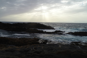 Fototapeta na wymiar sunset on the cliffs that bathe the Atlantic Ocean