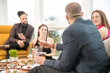 Group of people together at a cocktail party
