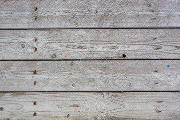 Obraz premium texture of the painted shabby wooden flooring made of boards, grunge background
