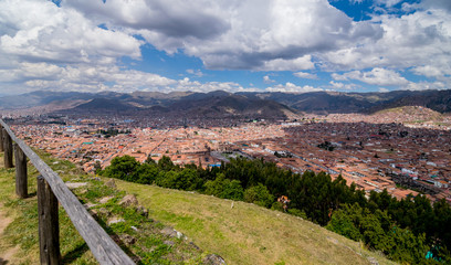 Fototapeta na wymiar Cusco, Peru - 05/24/2019: City wide view of Cusco, Peru from Sacsayhuaman.