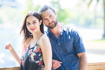 Naklejka premium Young attractive couple together outside