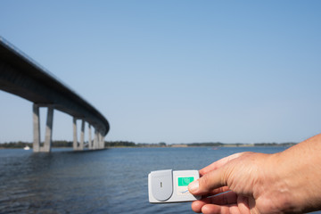 Showing a Brobizz decieve for payment over the Crown princess Mary Bridge in Frederikssund