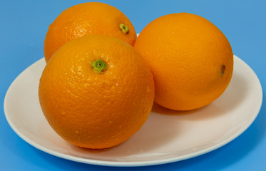 oranges on a plate