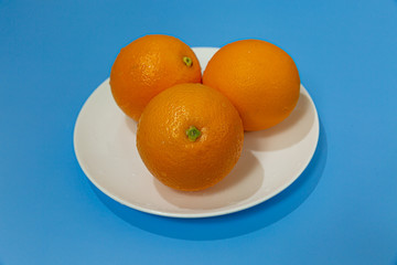oranges on a plate