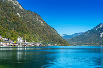 Fototapeta na wymiar Hallstatt, Austria. Popular town on alpine lake Hallstatter See in Austrian Alps mountains in autumn
