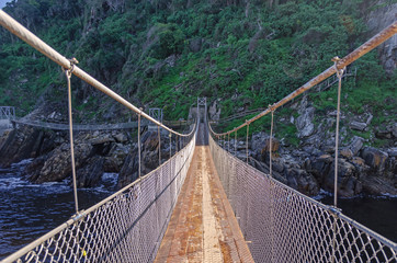Suspension footbridge over the Storms River in the Tsitsikamma National Park in South Africa