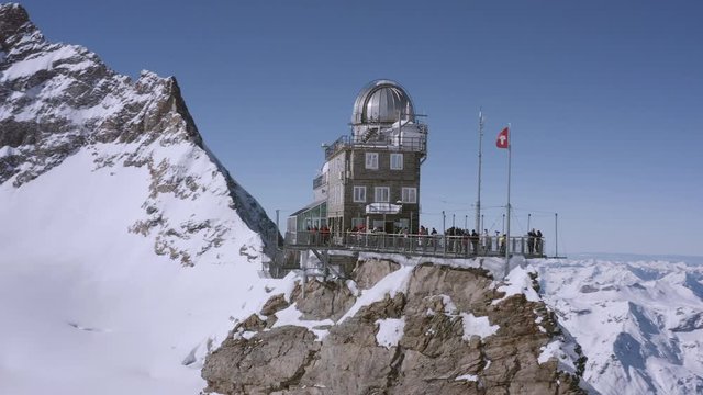 Fly Over Swiss Mountain Range Jungfraujoch Golden Hour European Winter Vacation Cinematic Nature 4k Slow Motion