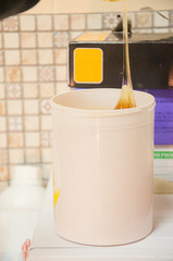 Process of waxing. Macro