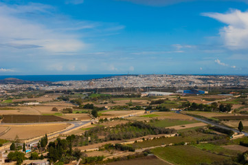 Fototapeta na wymiar Malta and green landscapes of valley and castles