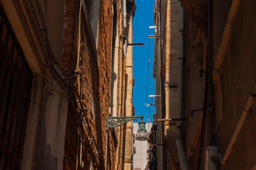 Old european street in summer. Warm light