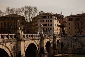 Fototapeta na wymiar Old stone bridge in Rome