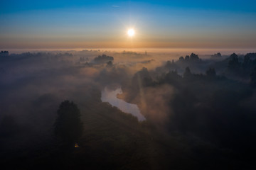 golden morning fog over the river
