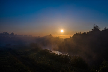 golden morning fog over the river