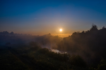 golden morning fog over the river