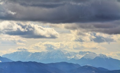 Fototapeta na wymiar Bucegi mountains with snow-capped peak