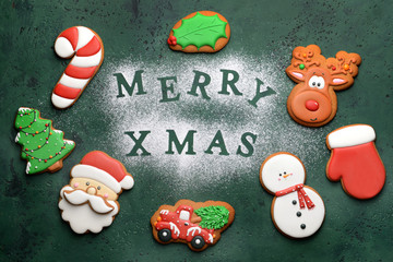 Naklejka premium Composition with tasty Christmas cookies on color background
