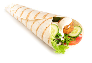 Tasty pita with falafel and vegetables on white background
