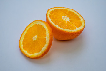 Fototapeta na wymiar Cut orange, orange slice isolated on white background