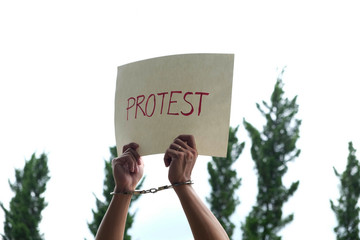 Police control violence in protest, arrest and suppress violence Handcuffing the accused Promoter.