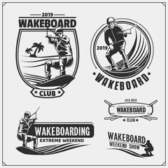 Wakeboarding silhouettes, labels and design elements. Set of emblems for wakeboard club and print design for t-shirt. - obrazy, fototapety, plakaty