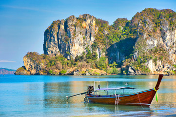 Sea view with long tail boat and mountain at Riley Beach, Krabi Province, Thailand