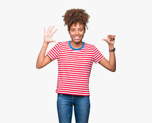 Beautiful young african american woman over isolated background showing and pointing up with fingers number six while smiling confident and happy.