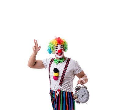 Funny clown with an alarm clock isolated on white background