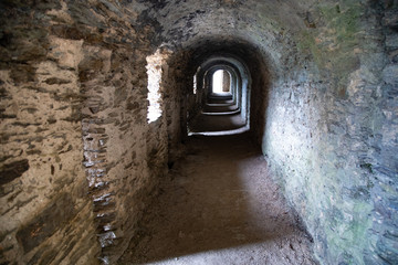 Fototapeta premium Inside an exterior tunnel of a castle