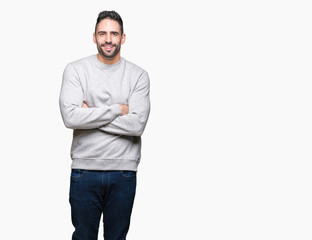 Young handsome man wearing sweatshirt over isolated background happy face smiling with crossed arms looking at the camera. Positive person.