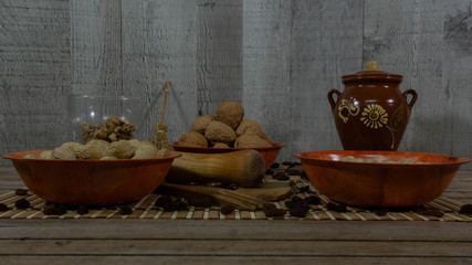 Fototapeta na wymiar assortment of nuts, hazelnuts, peanuts and raisins