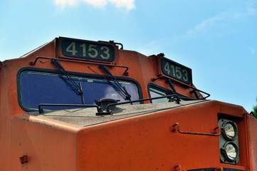 Closeup of a modern railroad diesel locomotive leading a freight train on its journey. Berwyn, Illinois, USA.