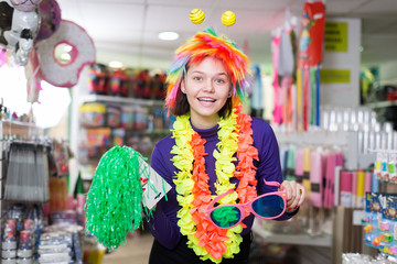 Female having fun in festival outfits store