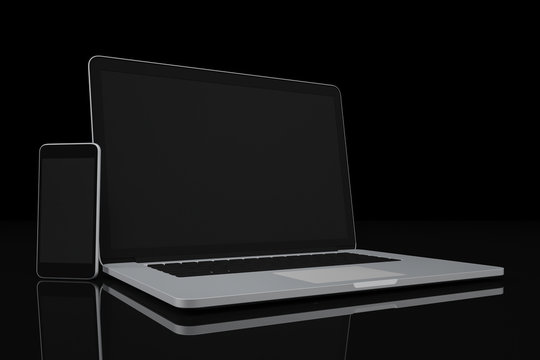 Computer laptop and smartphone blank display on black background workspace mock up design illustration 3D rendering