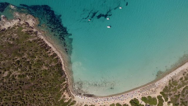 Amazing aerial shot of a beautiful beach with turquoise sea, Mari pintau, Sardinia