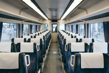 Interior of Japanese train with empty seats