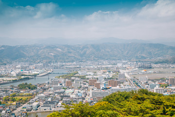 Kochi cityscape panorama from Godaisan mountain Observatory in Kochi, Shikoku, Japan