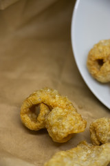 Crispy pork crackers. Thai food or snack made from pork skin, seasoned with salt or soy sauce and Fried with hot oil until crispy.