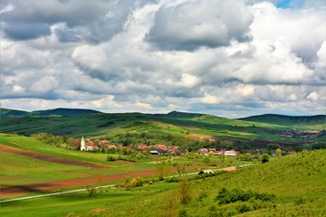 Fototapeta na wymiar A beautiful rural landscape in Transylvania. Village of Hodosa Mures county - Romania
