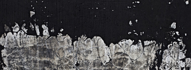 old black paint texture peeling off the concrete wall for dark theme banner background