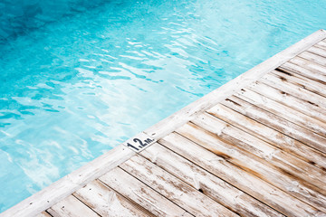 Beautiful rustic wooden pool side deck