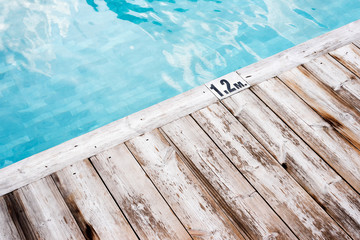 Beautiful rustic wooden pool side deck