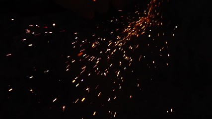 Angle Grinder Sparks Flying With Black Background In Slow Motion