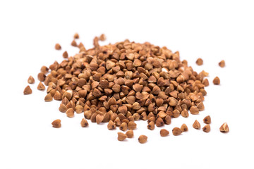 Pile of buckwheat isolated on white background. Top view.