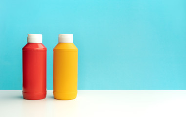 Bottles sauce( ketchup, mustard )on colorful bar counter