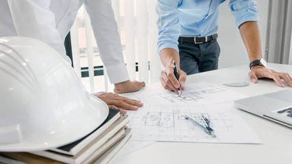 Interior architecture discussing with blueprint, Engineering Concept.