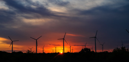 Landscape of evening with wind turbines